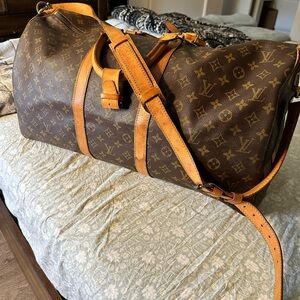 Authentic Louis Vuitton keepall 55 bandouliere travel monogram unisex with strap